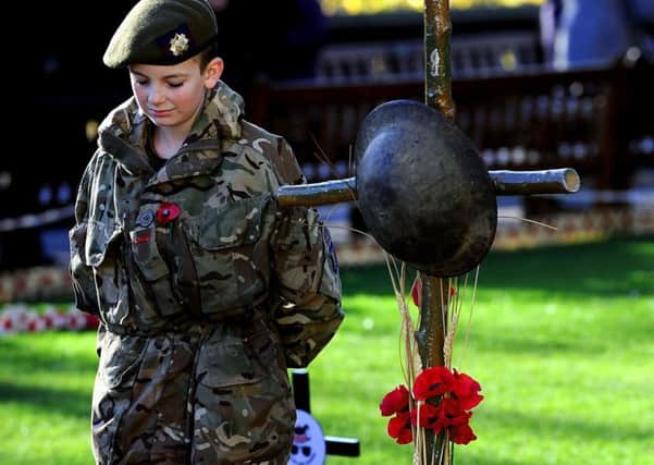 Army Cadet Force Nathan Skinner takes part in the Armistice Day Service in the city's Garden of Remembrance. Picture: Lisa Ferguson