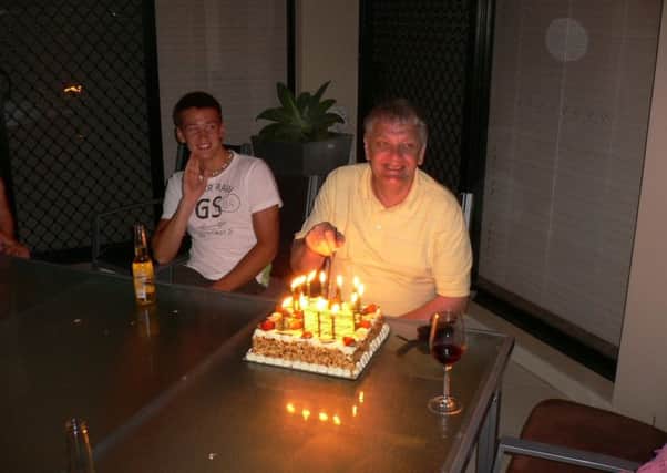 Shaun Woodburn pictured with his grandfather Oliver at his 65th birthday in Australia. Picture: contributed