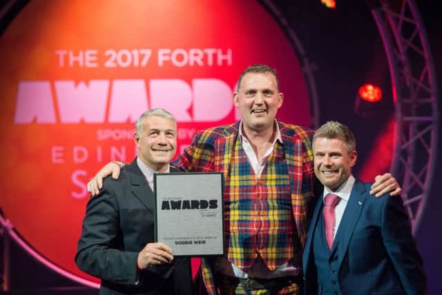 Scott Hastings presents the Contribution to Sport award to Doddie Weir. Picture: Ian Georgeson