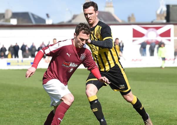 Ross Gray, left, pictured when playing for tomorrows opponents Linlithgow