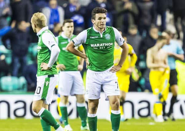 Hibs dejected players look on after the defeat by St Johnstone. Pic: SNS