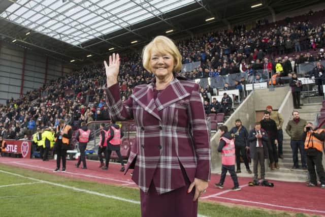 Hearts owner Ann Budge is all smiles in front of the new stand. Pic: SNS