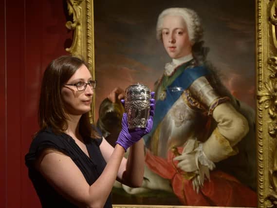 Curator Adrienne Hynes with part of Bonnie Prince Charlie's travelling canteen, one of the star objects in the exhibition.