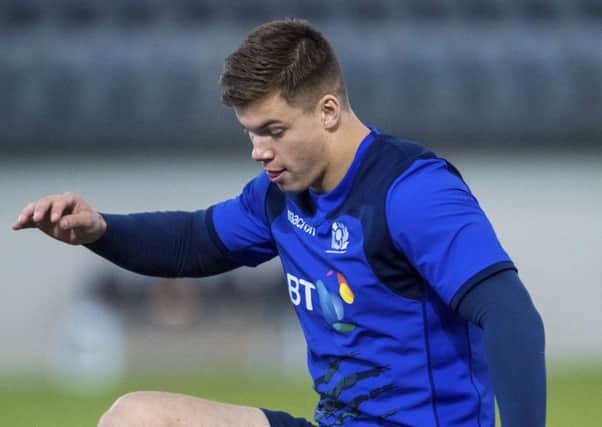 Huw Jones tests out his footwork at Scotland training. Pic: SNS