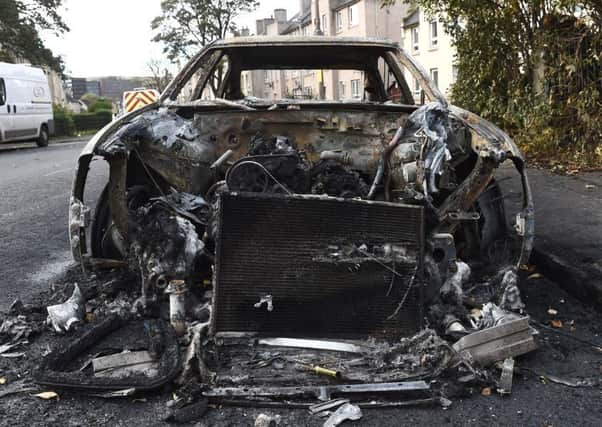 A burnt-out car in Craigentinny following the Bonfire Night carnage: Picture: Lisa Ferguson