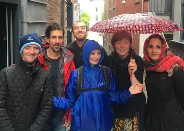 Biffy MacKay, centre, is a tour guide for  Invisible Edinburgh Homeless tour guides