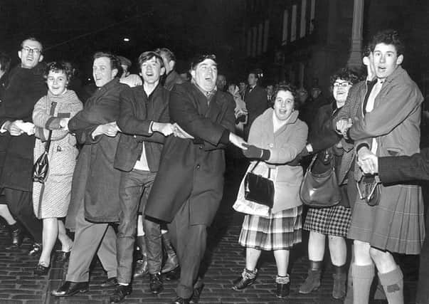 Hogmanay celebrations have changed in the city since the Tron Kirk was the place to be