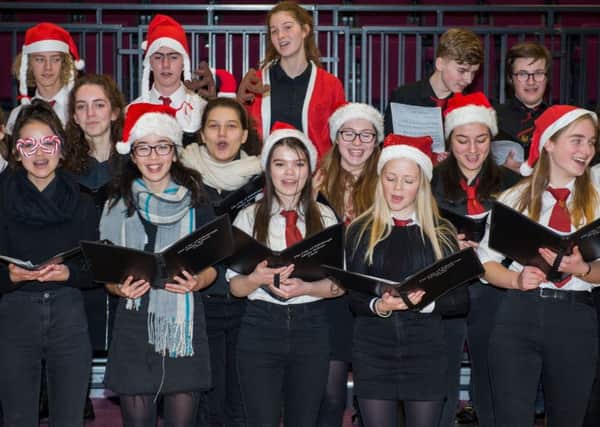 Singers from the City of Edinburgh Music School will be spreading cheer with a bus performance