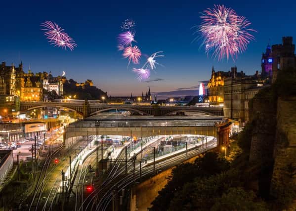 Fireworks over the historical town of Edinburgh the scottish capital. Sylvester in Edinburgh