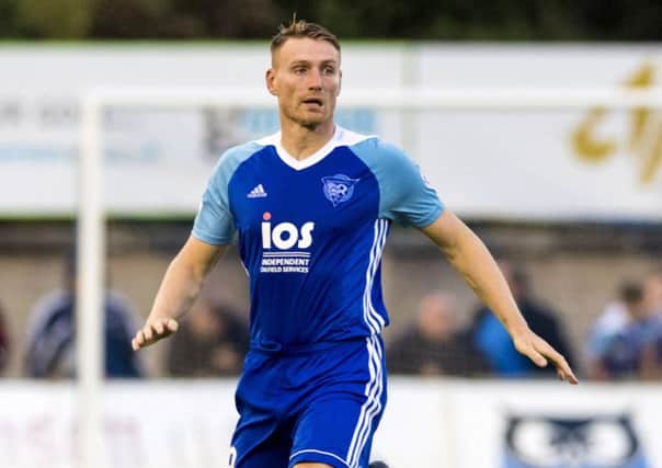 Rory McAllister in action for Peterhead