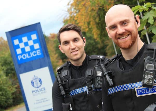 Hero police officers PC Paul Brownlee and PC Greg Gavin.