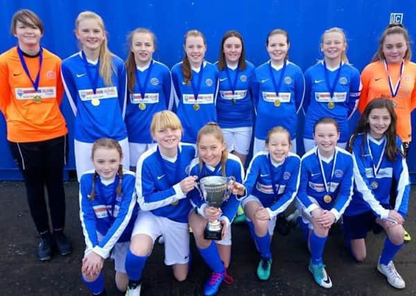 Musselburgh Windsor under-13 girls football team ended a six-year dominance by Hearts and Hibs when winning their Kim Little League title