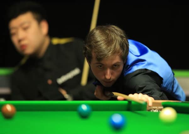 Scott Donaldson during his match with Li Hang. Pic:  Mike Egerton/PA Wire