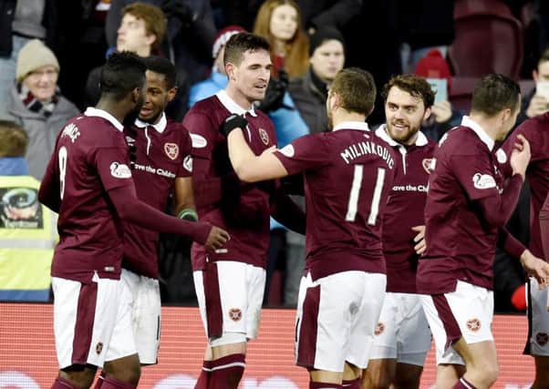 Kyle Lafferty celebrates after scoring for Hearts against Motherwell
