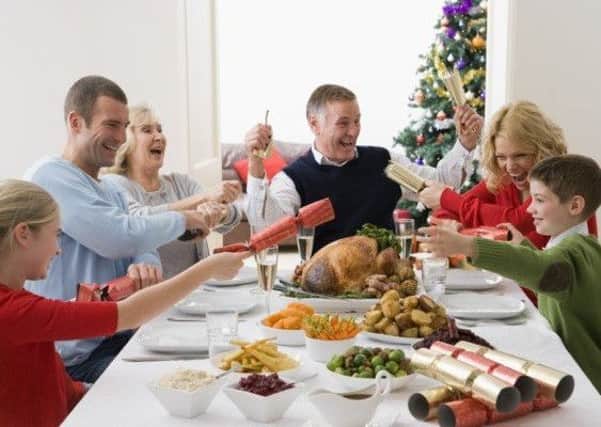 Keeping the Xmas spirit during family Christmas dinner is vital. Picture: Getty
