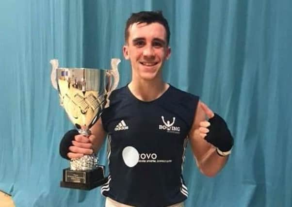 Matty McHale shows off his trophy. Pic: Lochend ABC