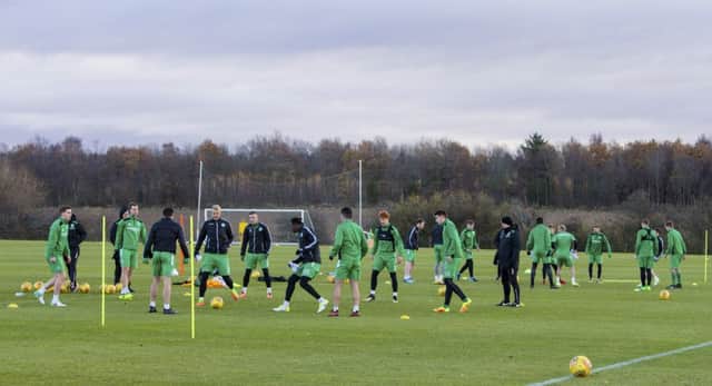 30/11/17 
 HIBERNIAN TRAINING 
 HIBERNIAN TRAINING CENTRE - TRANENT
 Hibernian's players are put through their paces

Neil Lennon and Garry Parker oversee a training session at the Hibs training centre at East Mains. Picture: SNS Group