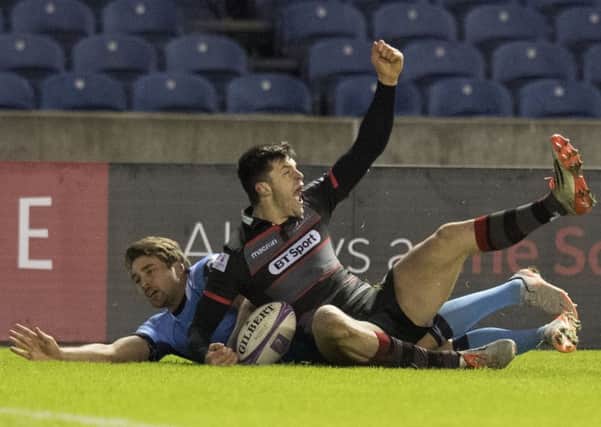 Blair Kinghorn celebrates scoring Edinburgh's second try in Saturday night's win at Murrayfield. Picture: Ross Parker/SNS