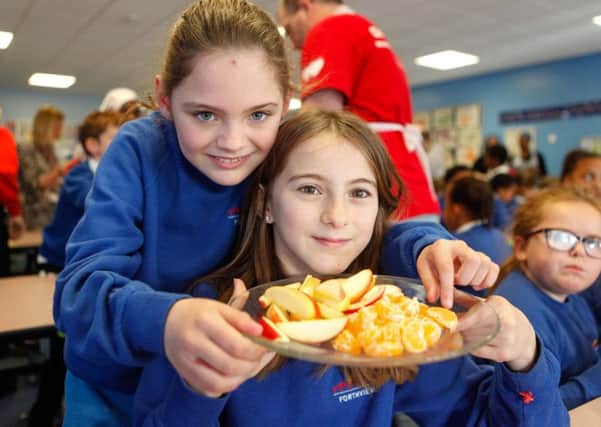 Sammy Halliday, 9, and Becca North, 10, at Forthview Primary School's breakfast club (Picture: Toby Williams)