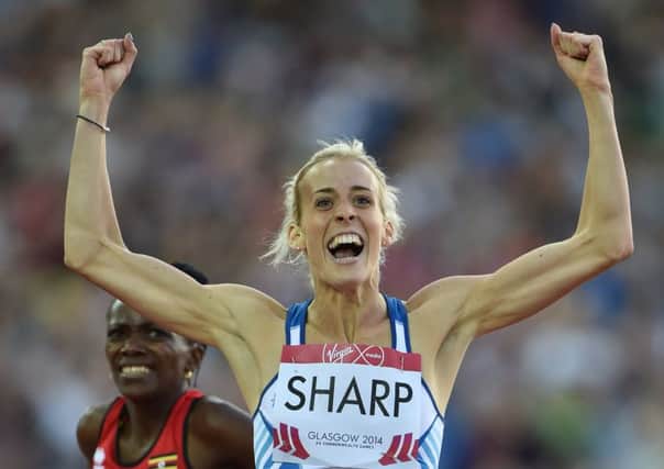 Lynsey Sharp celebrates winning 800m silver in Glasgow in 2014