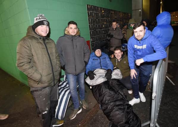 Hibs fans camp out at Easter Road ahead of ticket sales for the festive derby against Hearts. Pic: Greg Macvean