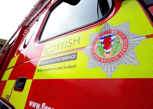 Firefighters rescued an elderly woman in Edinburgh