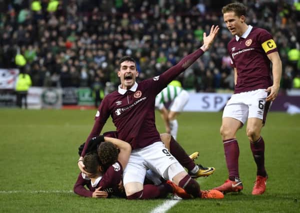 Kyle Lafferty celebrates with his Hearts team-mates