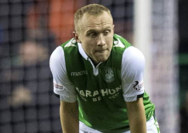 Dylan McGeouch shows his disappointment as Rangers mugged Hibs
