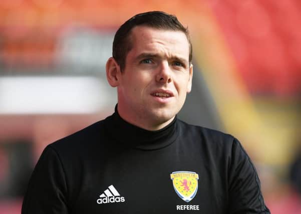 Linesman Douglas Ross ran the line at the Nou Camp earning nearly Â£2000. Picture: SNS/Craig Foy