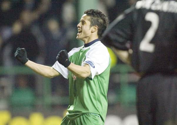 Merouane Zemmama celebrates in front of the Hibs fans after scoring the fourth goal