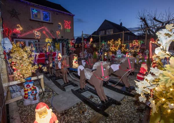 Festively decorated home and garden of David Brown in Bonnyrigg. Picture: TSPL