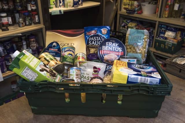 Workers describe what it's like working in an Edinburgh Foodbank over Christmas. Picture: TSPL