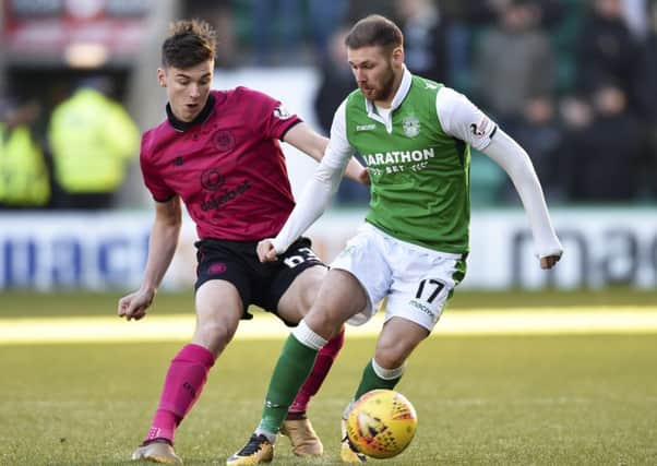 Martin Boyle, right, is tied to Hibs until 2021. Picture: SNS