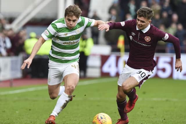 Brandon battles with Celtic's James Forrest