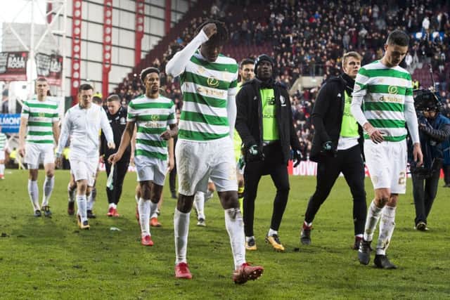 Celtic's players trudge off at full-time. Pic: SNS