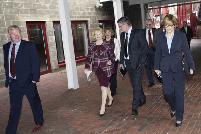 Hearts chairwoman Ann Budge and manager Craig Levein arrive at Tynecastle for today's agm. Pic: Greg Macvean