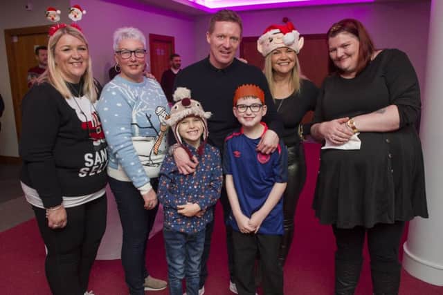 Gary Locke with volunteers and guests at Hearts Christmas lunch. Picture: Ian Rutherford