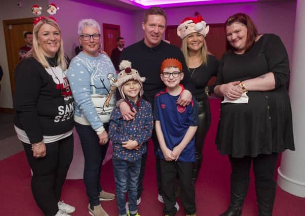 Gary Locke with volunteers and guests at Hearts Christmas lunch. Picture: Ian Rutherford