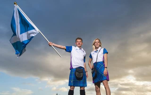The athletes with your new uniforms. Picture: Alistair Devine
