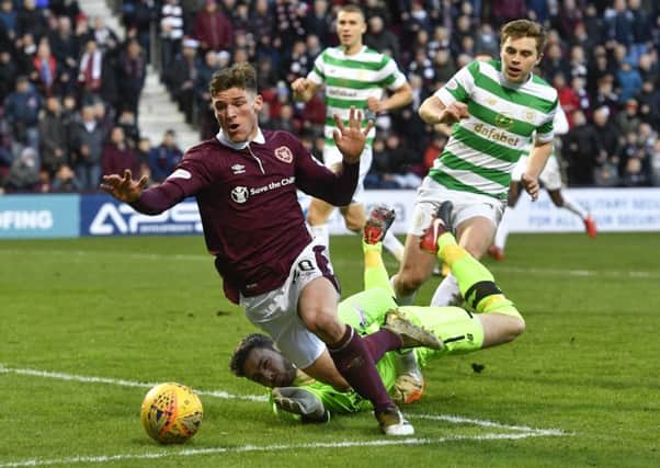 Ross Callachan is taken down by Craig Gordon to win a penalty