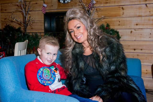 Luke with mum Jennifer Ure Stewart. Picture: Ian Georgeson