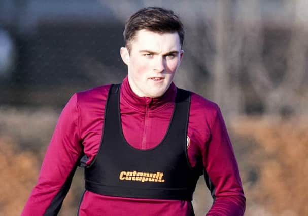 John Souttar trains at Riccarton. The defender was a frustrated spectator as Hearts demolished Celtic