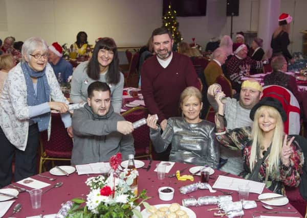 Volunteers and guests at Hearts' Christmas lunch. Picture: Ian Rutherford