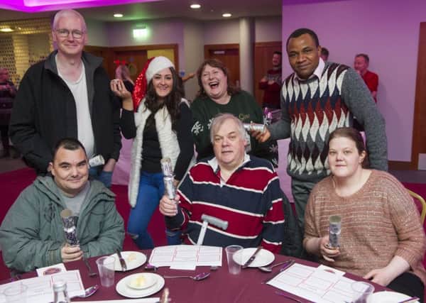 Volunteers and guests get in the Christmas spirit at Tynecastle. Picture: Ian Rutherford