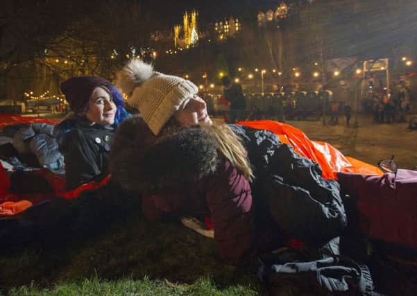 Two young women bed down for the night at Social Bite's Sleep in the Park event. Picture: Ian Rutherford