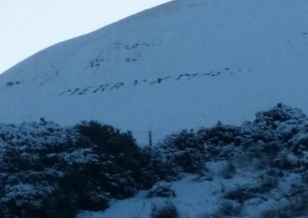 The Merry Xmas message appeared on Boxing Day. Picture: @ntaluis/Instagram