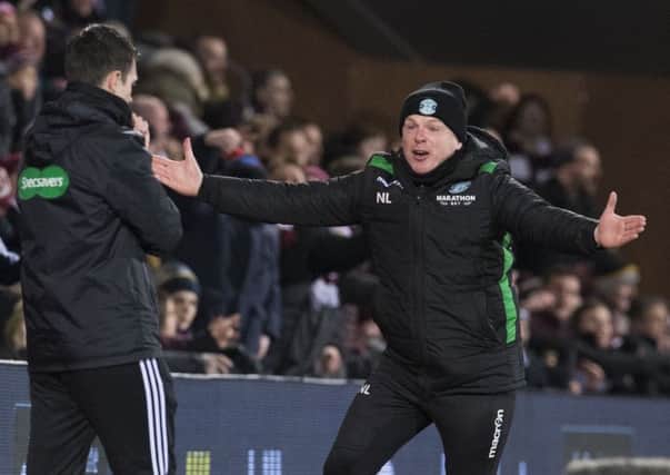 Neil Lennon remonstrates with the fourth official after Oli Shaw's attempt at goal