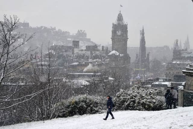 Snow falls in Edinburgh on Friday