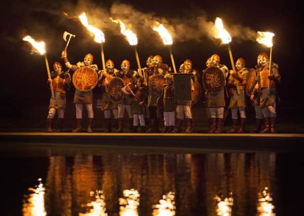 Vikings get ready to lead Edinburgh's Torchlight Procession. Picture: David Cheskin.
