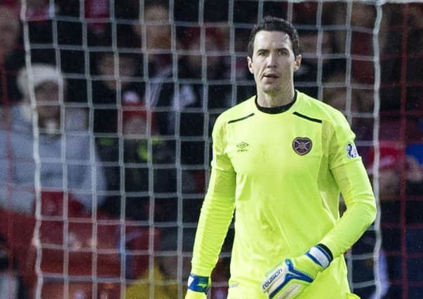 Hearts goalkeeper Jon McLaughlin made some key saves as the Jambos left Aberdeen with a draw. Pic: SNS